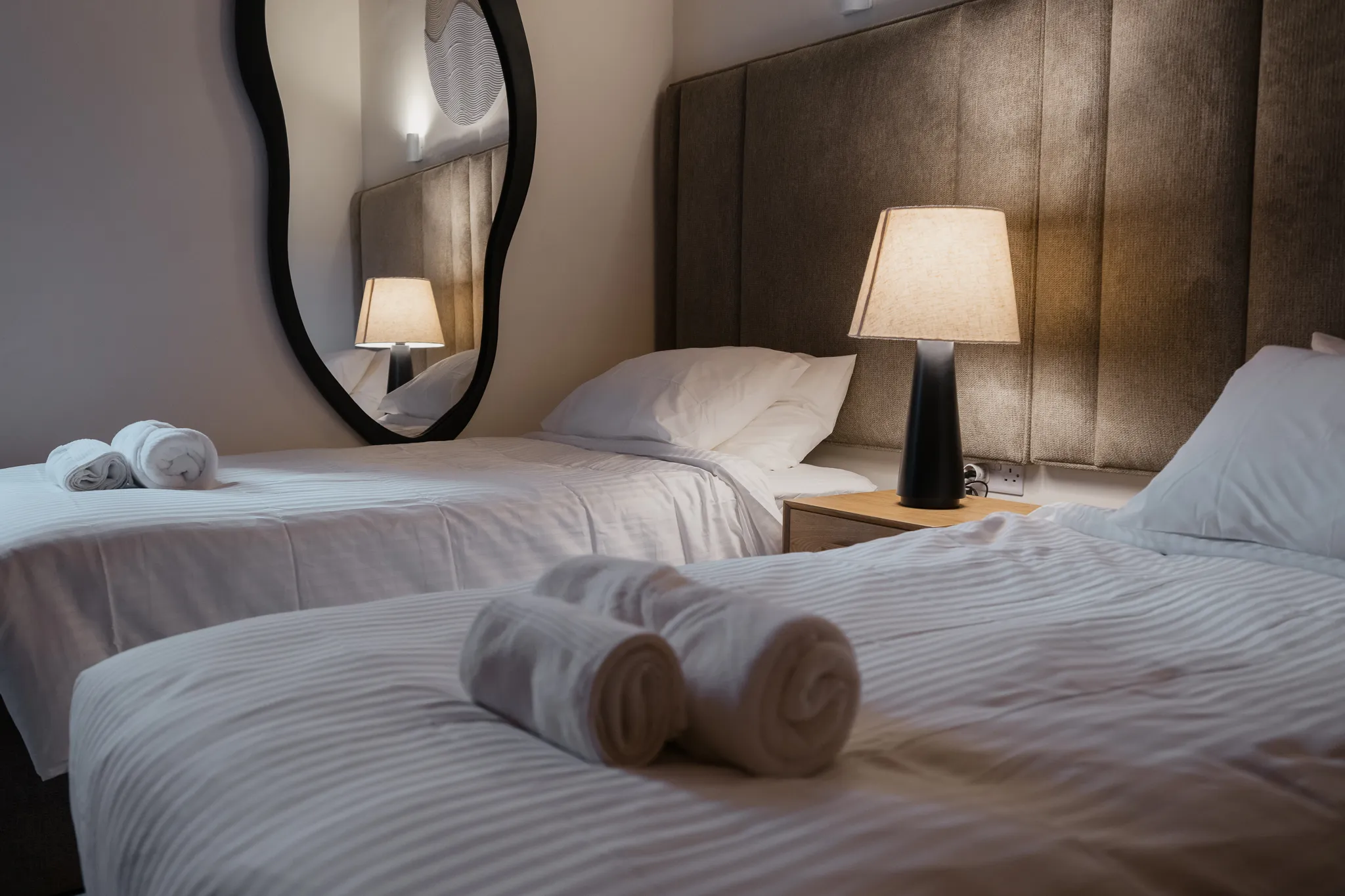 Twin beds with the wave mirror