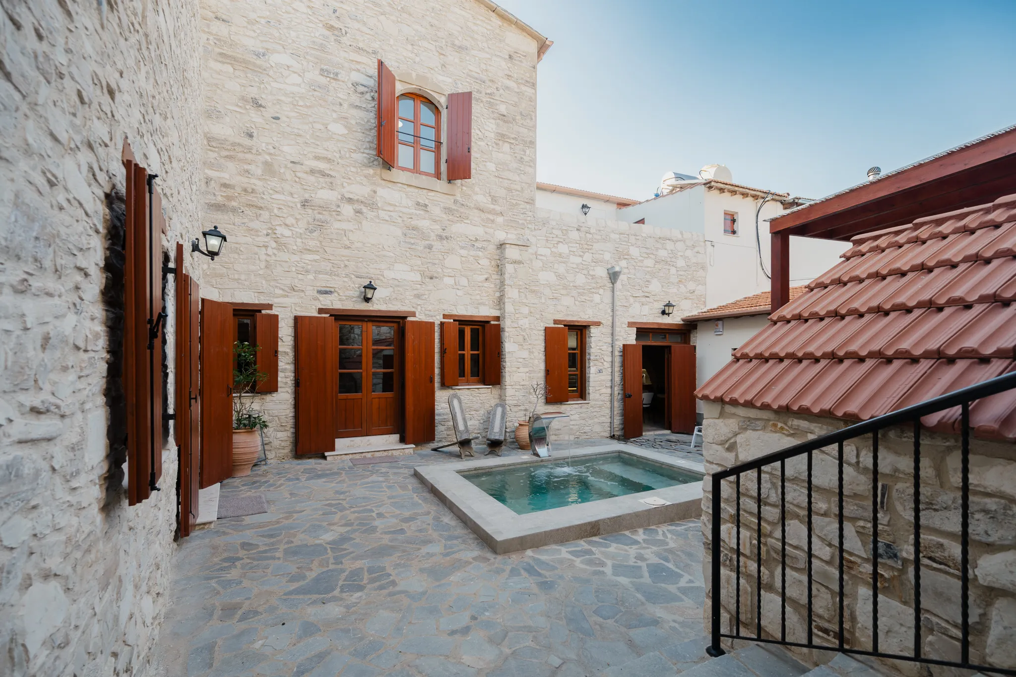 The stone courtyard and plunge pool