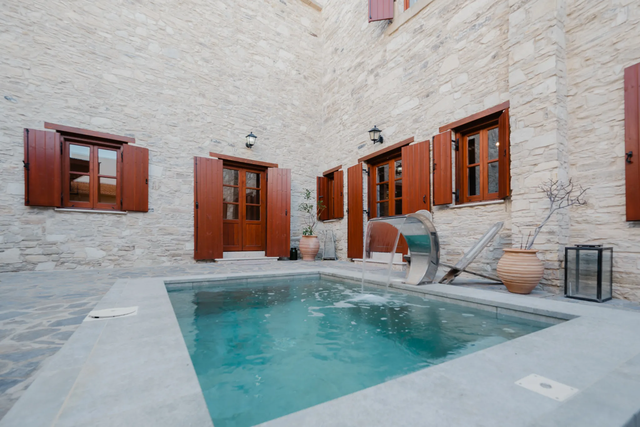 The plunge pool and courtyard