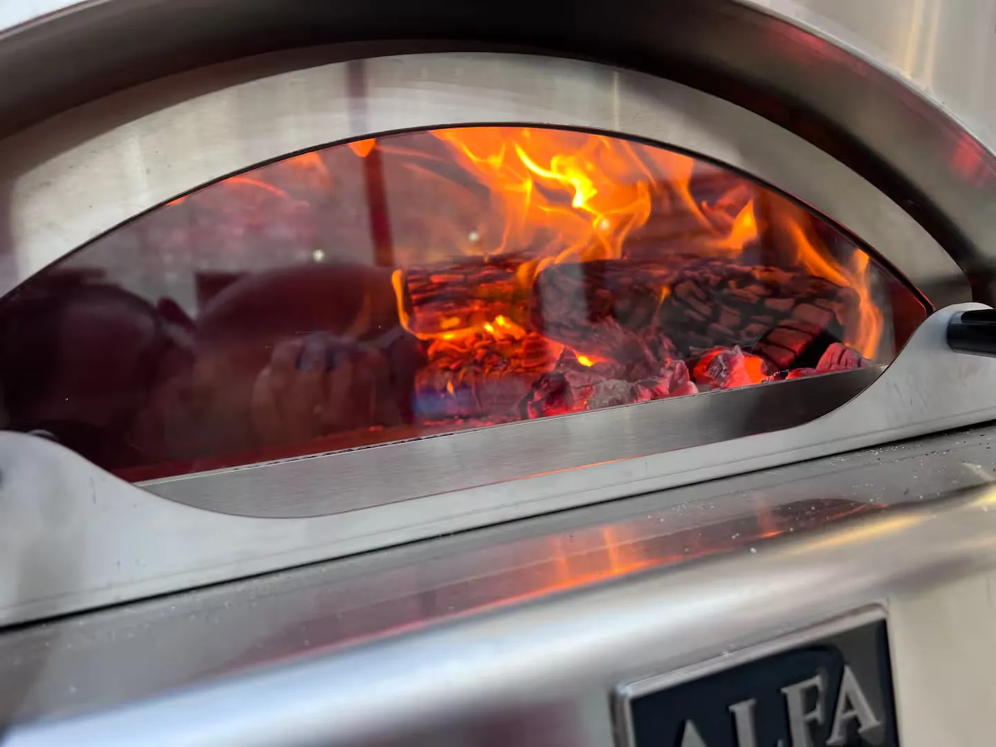 Flames inside the Alfa pizza oven